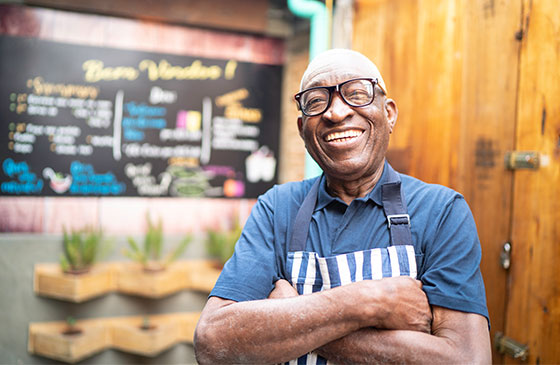 Smiling man in apron