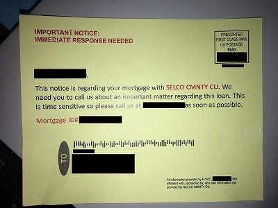 Redacted junk mail postcard