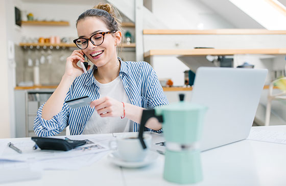 Business owner paying over the phone