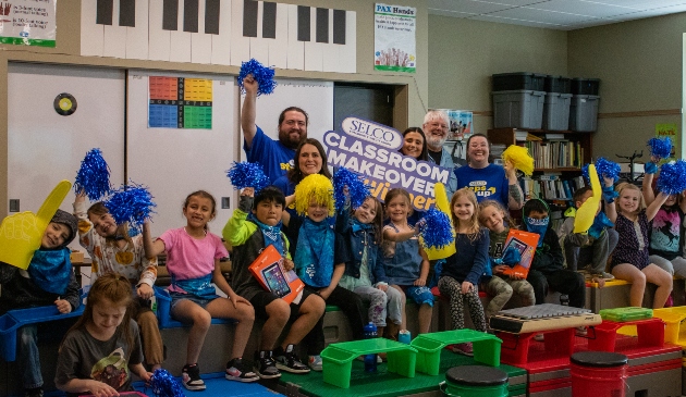 [Insert Jefferson school visit photo with pom poms