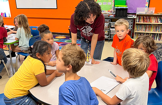 Financial education being taught at Boys and Girls Club by SELCO Community Credit Union employees 