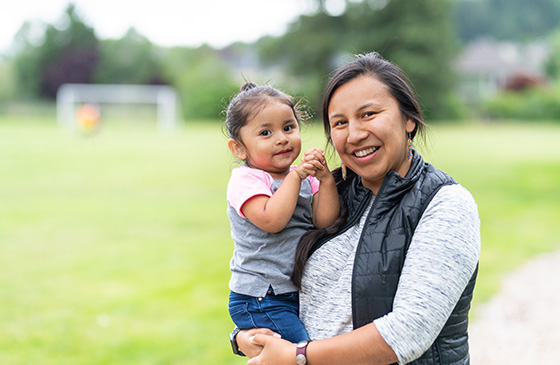 Woman holding daughter