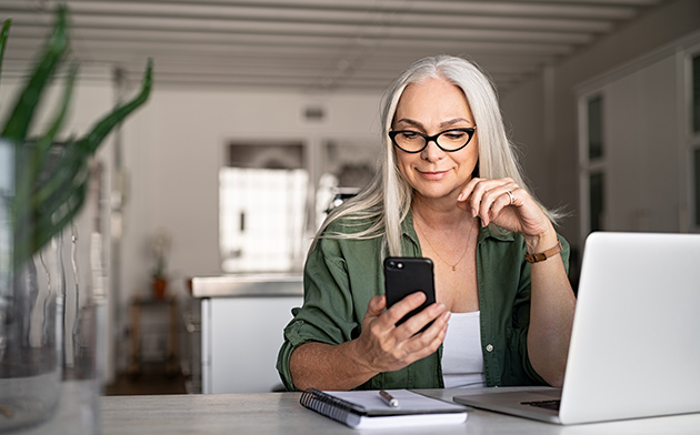 Stylish woman banking online